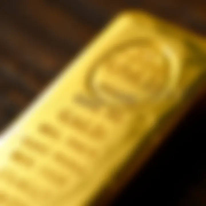 Close-up of a gold bar engraved with purity marks and investment details